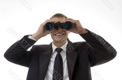 young accountant viewing through binoculars