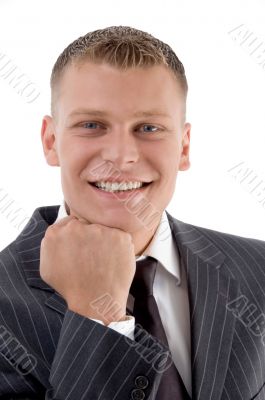 pleased businessman showing his face