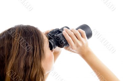 female watching through binocular