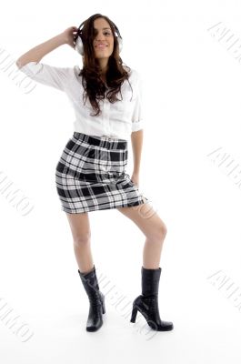 woman listening to music with headphones