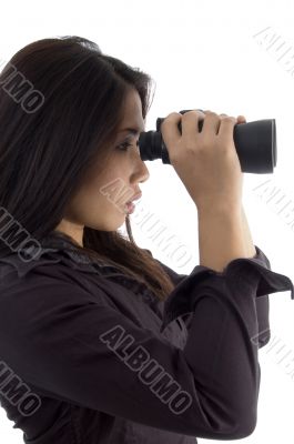 woman looking through binocular