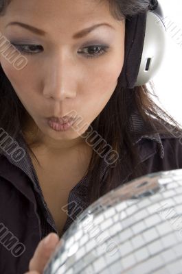 woman having disco mirror ball