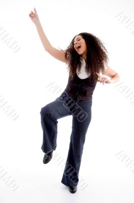young pointing dancing woman