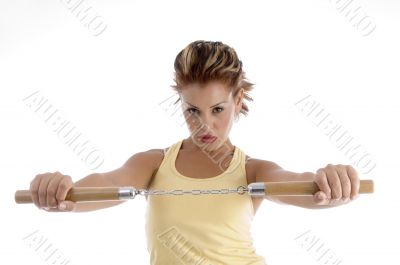 woman with nunchaku