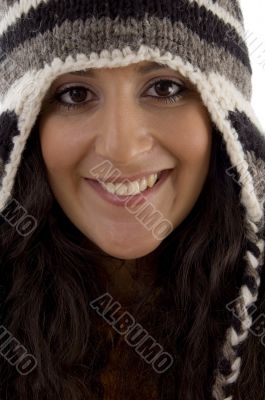 close up of beautiful woman wearing cap