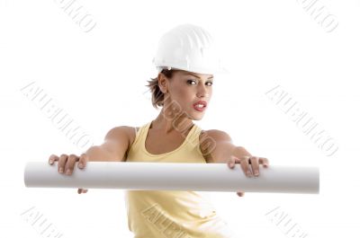 young woman with architect helmet and blue prints