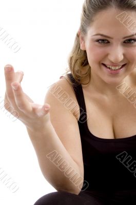 smiling girl showing hand gesture