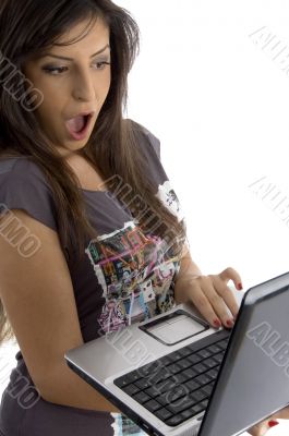 woman holding laptop