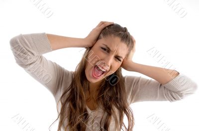 woman screaming and holding her head