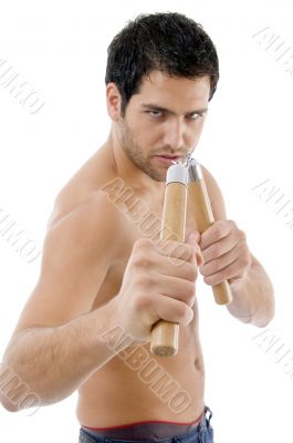 strong man holding nunchaku