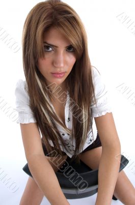 stylist model sitting in cool pose