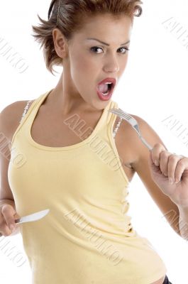 woman posing with fork and knife