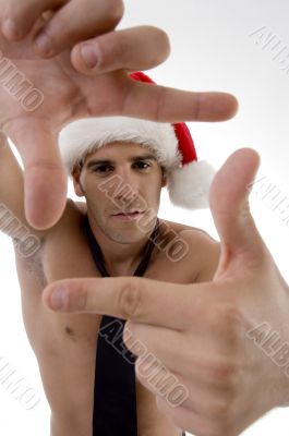 male model wearing christmas hat and framing