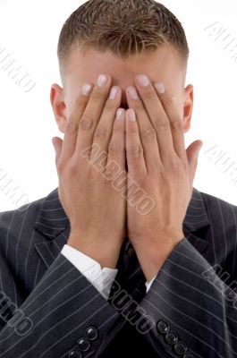 shy businessman hiding his face