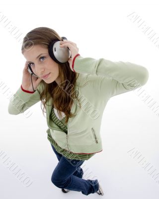 woman listening to headset enjoying