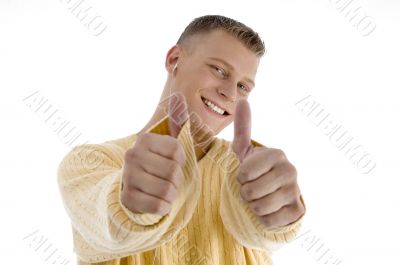 handsome man showing good luck sign