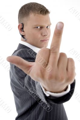 businessman with vulgar hand gesture