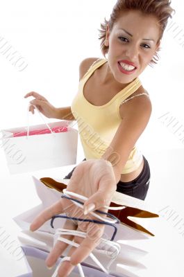 smiling female with holding carry bags