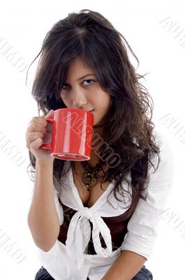 sexy teenager posing with coffee mug