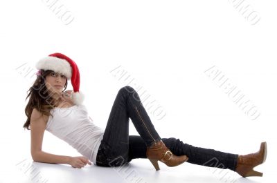 laying glamorous woman with christmas hat
