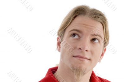 smart young male looking sideways smart young male looking sideways