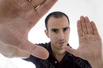 smart pose of young guy with open palms