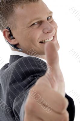 successful executive with thumbs up hand gesture