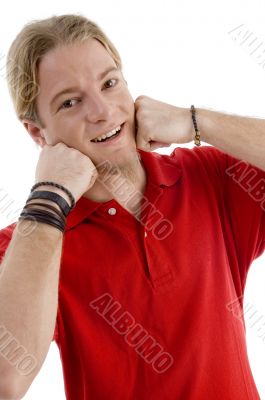 young american male posing with his hands on chin