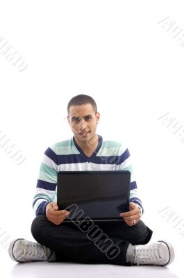 teenager guy working on laptop