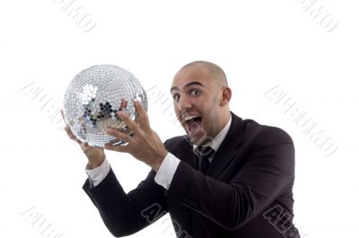 young accountant holding disco ball