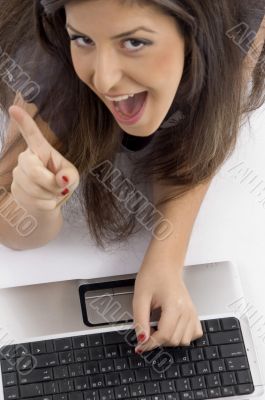 cheerful female busy with laptop