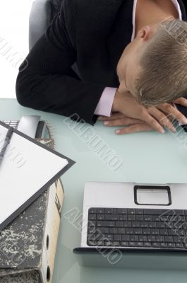 sleeping businessman in office