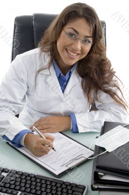 smiling adult doctor in clinic