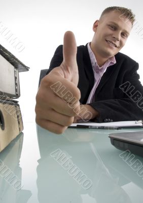 smiling manager showing approval sign