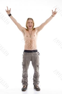 shirtless male raising his hands