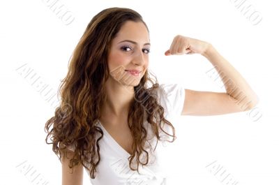 attractive female showing muscles