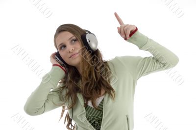 woman in dancing posture while listening music