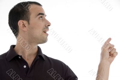 smart pose of young guy pointing