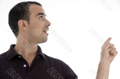 smart pose of young guy pointing smart pose of young guy pointing