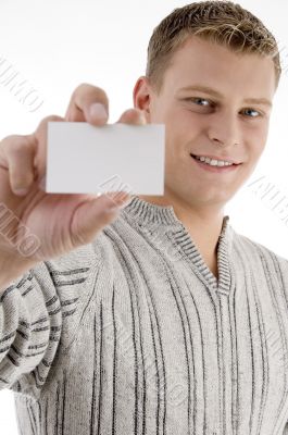 smiling man showing business card