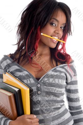 teenager student holding her study books