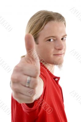  male showing thumbs up hand gesture