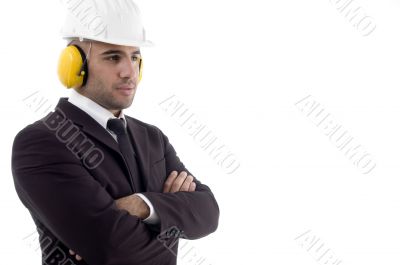 folded arm engineer wearing earplugs