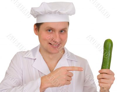 Cook with cucumber in hand