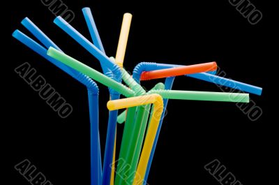 drinking straws on black