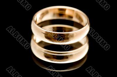 Gold ring on black macro