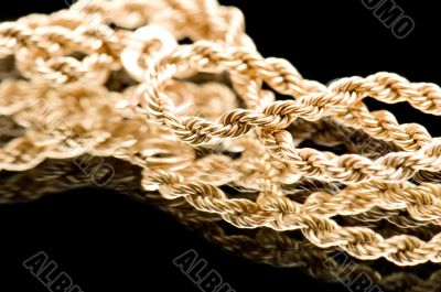Golden chain on black macro
