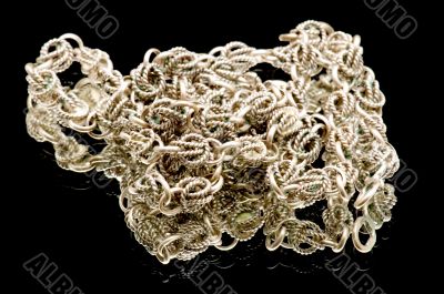 Silver chain on black