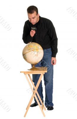 Man Examining The Globe Man Examining The Globe