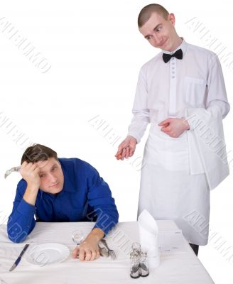 Waiter and guest of restaurant